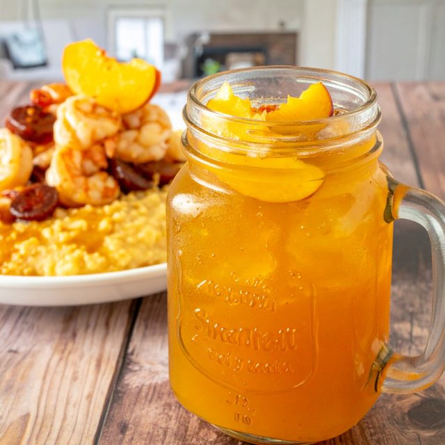 Charleston, South Carolina
Bourbon Sweet Tea paired with Shrimp & Grits
In Charleston, sweet tea is a religion. Add bourbon and it becomes something sacred. Poured over crushed ice in a mason jar with a fresh peach slice, this Low Country staple is all warmth and gold. Paired with creamy stone-ground grits topped with sautéed shrimp, andouille, and a splash of sherry. The South at its finest. 🍑🌿
#BourbonSweetTea #ShrimpAndGrits #CharlestonEats #ArizonaCulinaryInstitute #SouthernFriday