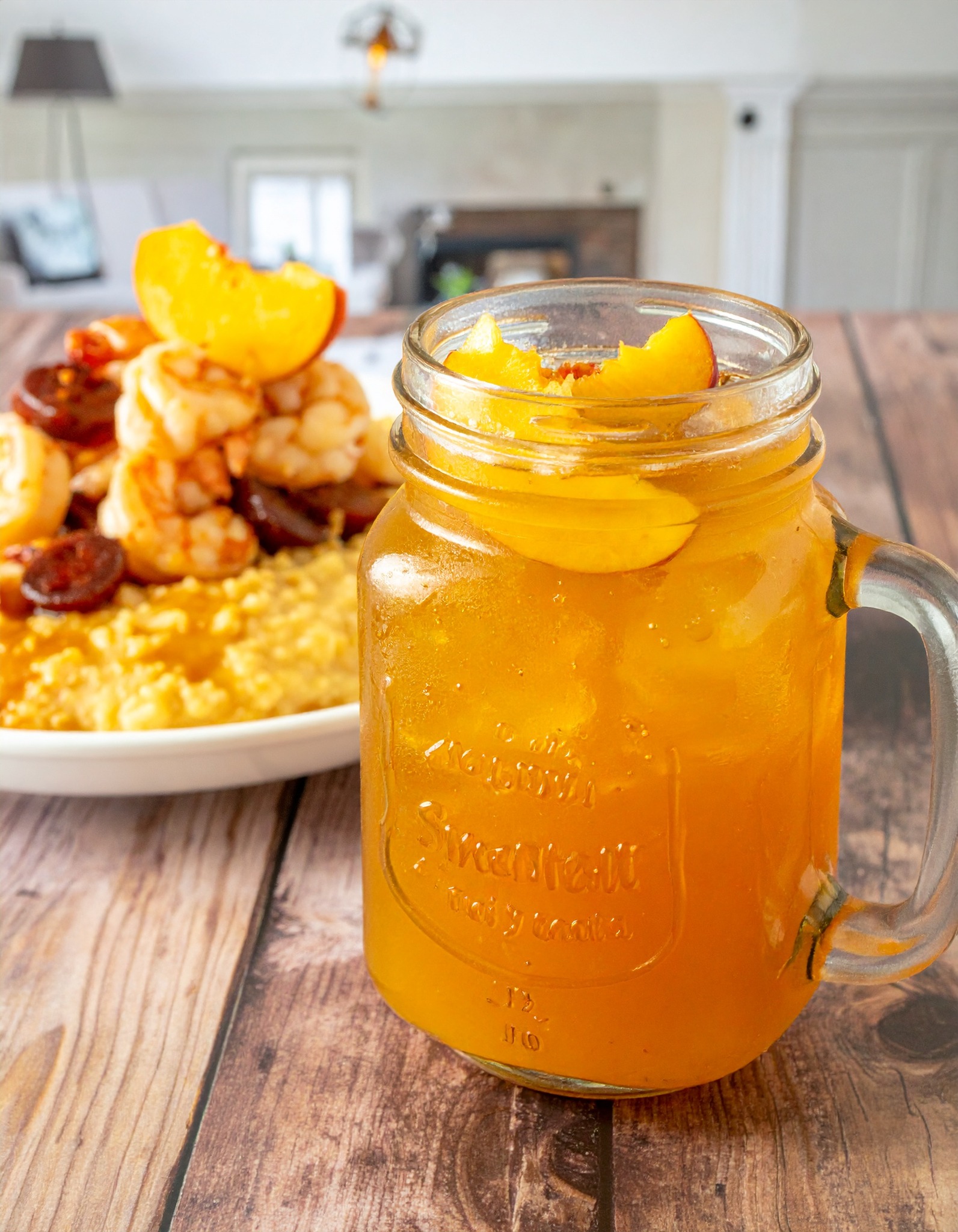 Charleston, South Carolina
Bourbon Sweet Tea paired with Shrimp & Grits
In Charleston, sweet tea is a religion. Add bourbon and it becomes something sacred. Poured over crushed ice in a mason jar with a fresh peach slice, this Low Country staple is all warmth and gold. Paired with creamy stone-ground grits topped with sautéed shrimp, andouille, and a splash of sherry. The South at its finest. 🍑🌿
#BourbonSweetTea #ShrimpAndGrits #CharlestonEats #ArizonaCulinaryInstitute #SouthernFriday
